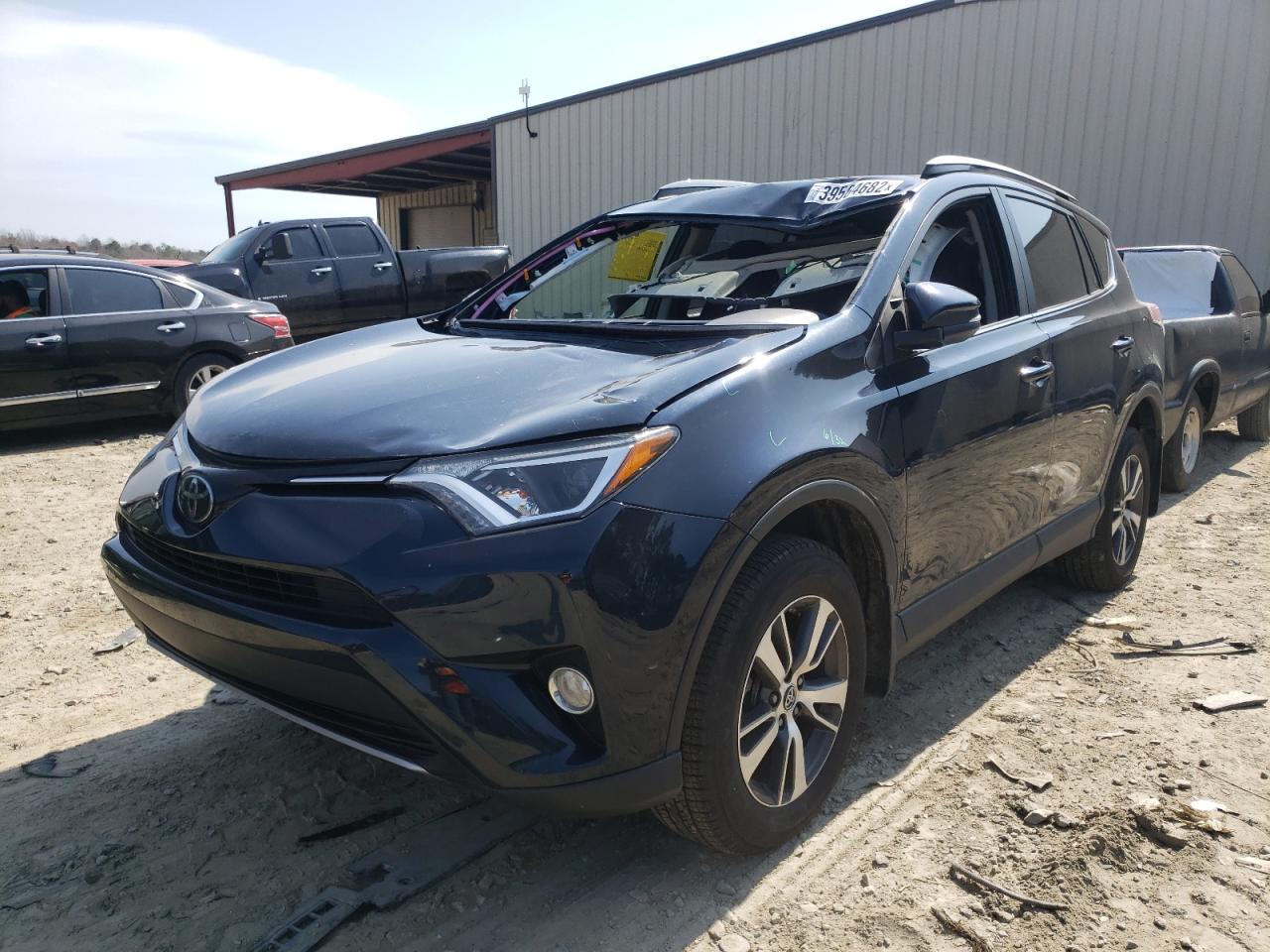 Photo 2 from auction – 2018 TOYOTA RAV4 ADVEN with VIN JTMRFREV8JJ221632