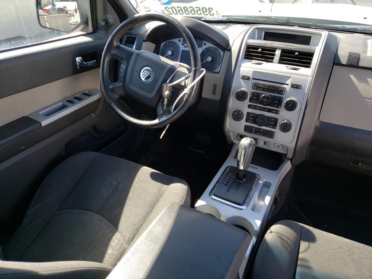 Photo 9 from auction – 2011 MERCURY MARINER with VIN 4M2CN8B76BKJ05859