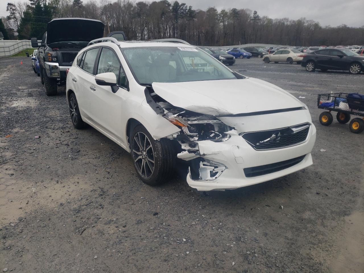SUBARU IMPREZA LI 2018 with VIN 4S3GTAU6XJ3721209 - Photo from auction