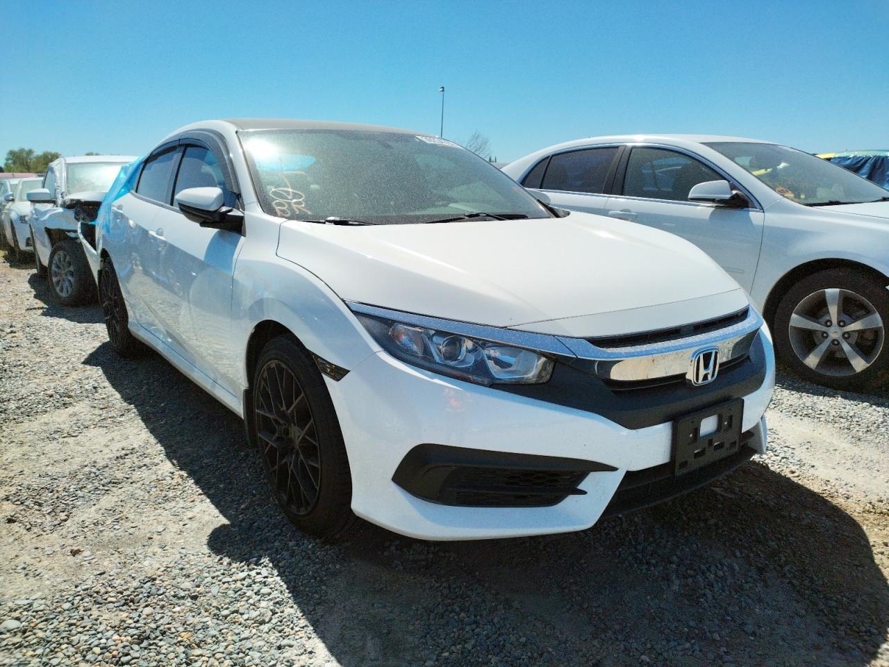 HONDA CIVIC LX 2016 with VIN 19XFC2F57GE200262 - Photo from auction