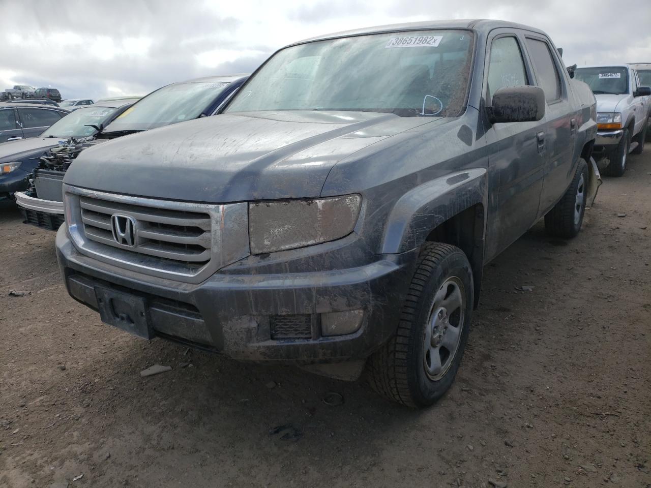 Photo 2 from auction – 2013 HONDA RIDGELINE with VIN 5FPYK1F20DB501903