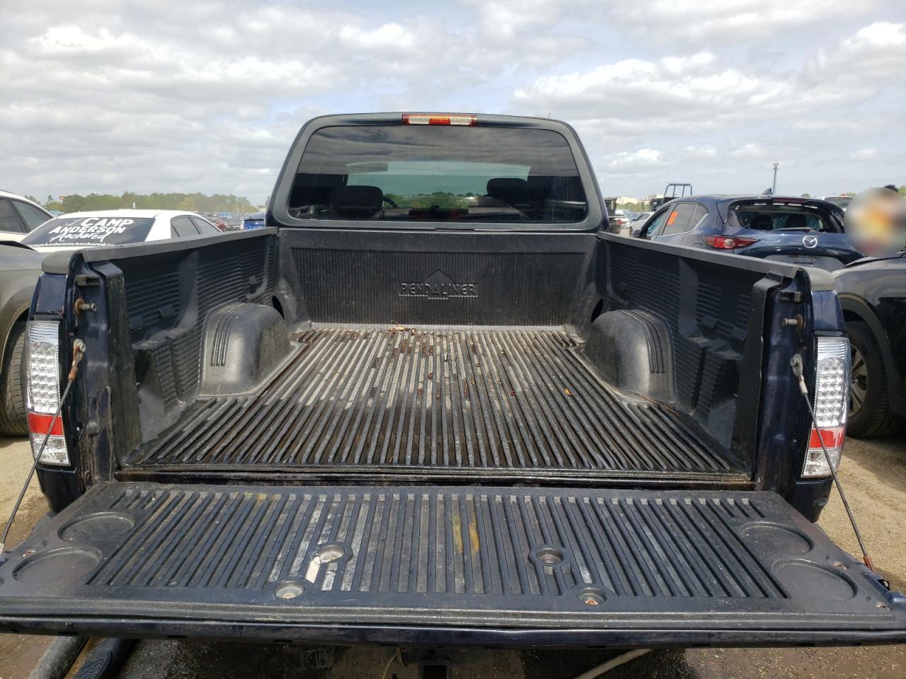 Photo 9 from auction – 2003 FORD F150 with VIN 1FTRX18L33NA98729