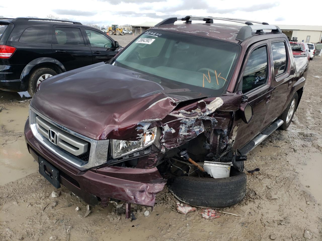 Photo 2 from auction – 2010 HONDA RIDGELINE with VIN 5FPYK1F41AB002508