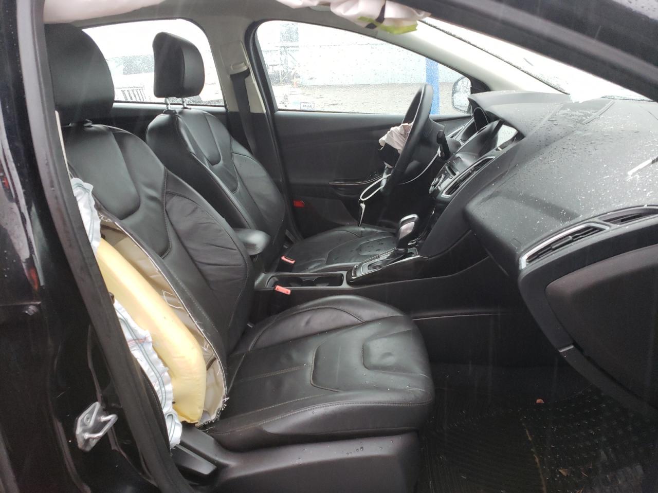 Photo 5 from auction – 2016 FORD FOCUS TITA with VIN 1FADP3J26GL237251