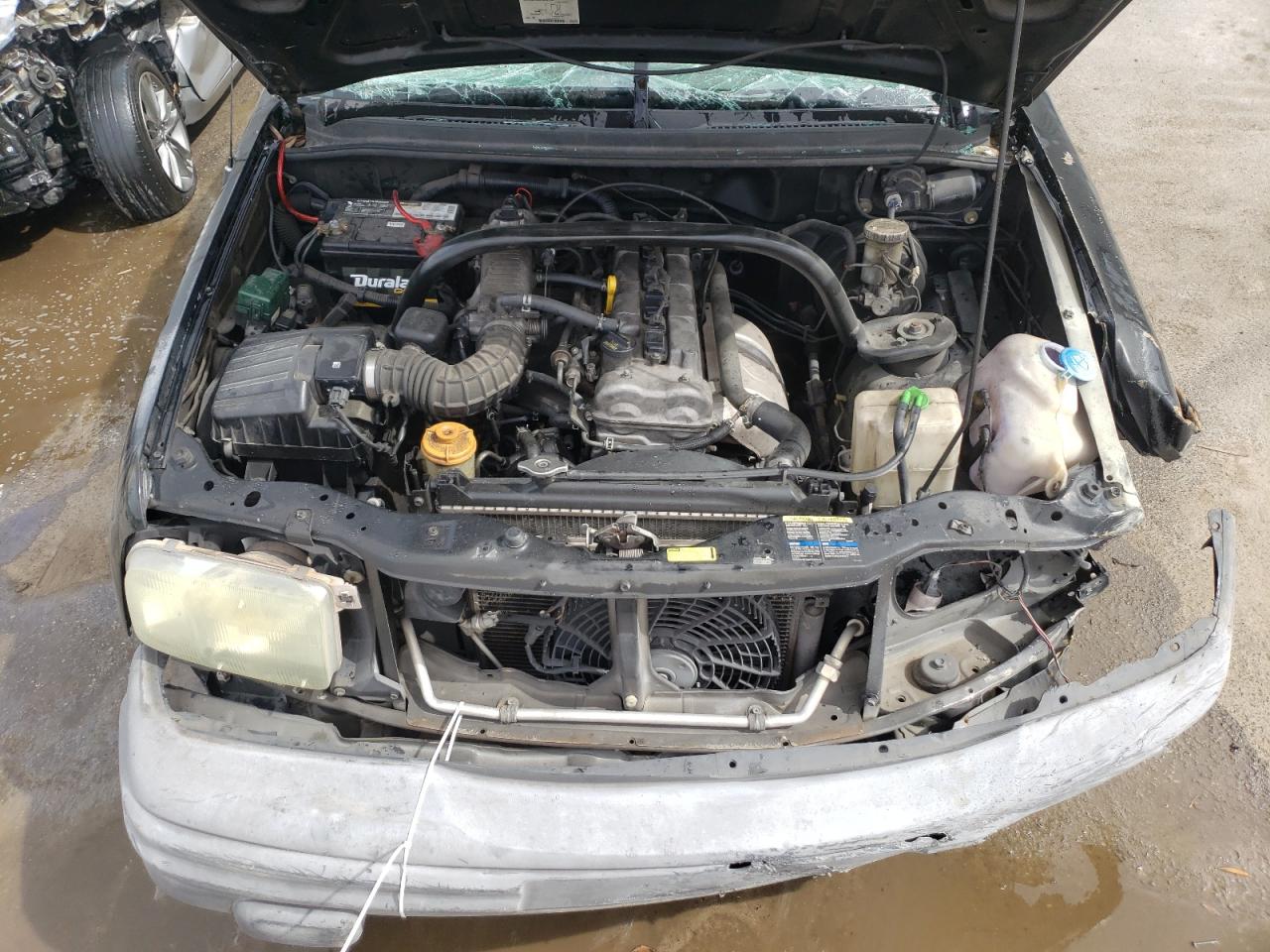 Photo 7 from auction – 2003 CHEVROLET TRACKER with VIN 2CNBE13C736953186