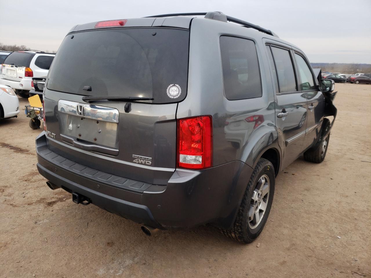 Photo 4 from auction – 2011 HONDA PILOT TOUR with VIN 5FNYF4H90BB105265