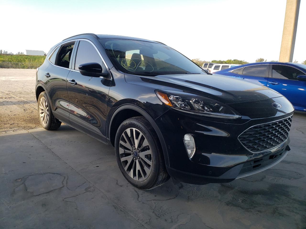 FORD ESCAPE TIT 2020 with VIN 1FMCU9J90LUB15113 - Photo from auction