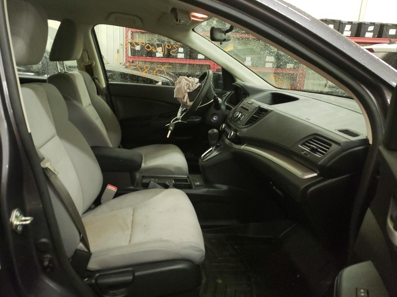 Photo 5 from auction – 2016 HONDA CR-V LX with VIN 5J6RM4H38GL075730