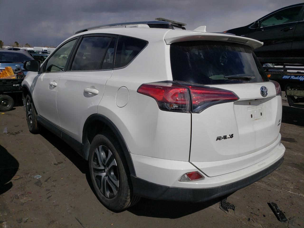Photo 3 from auction – 2017 TOYOTA RAV4 LE with VIN JTMBFREVXHD210240