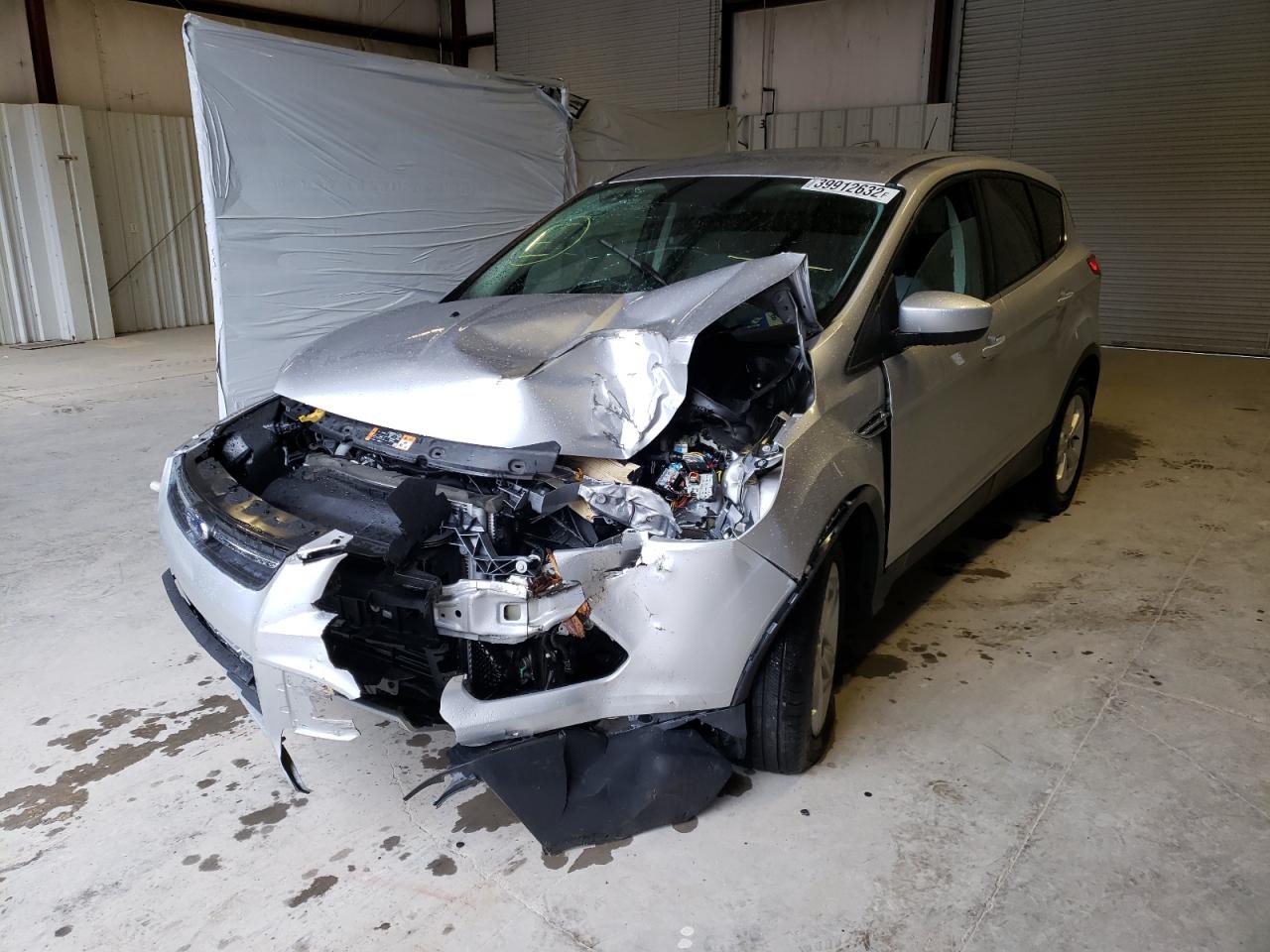 Photo 2 from auction – 2016 FORD ESCAPE SE with VIN 1FMCU9GX9GUB93725
