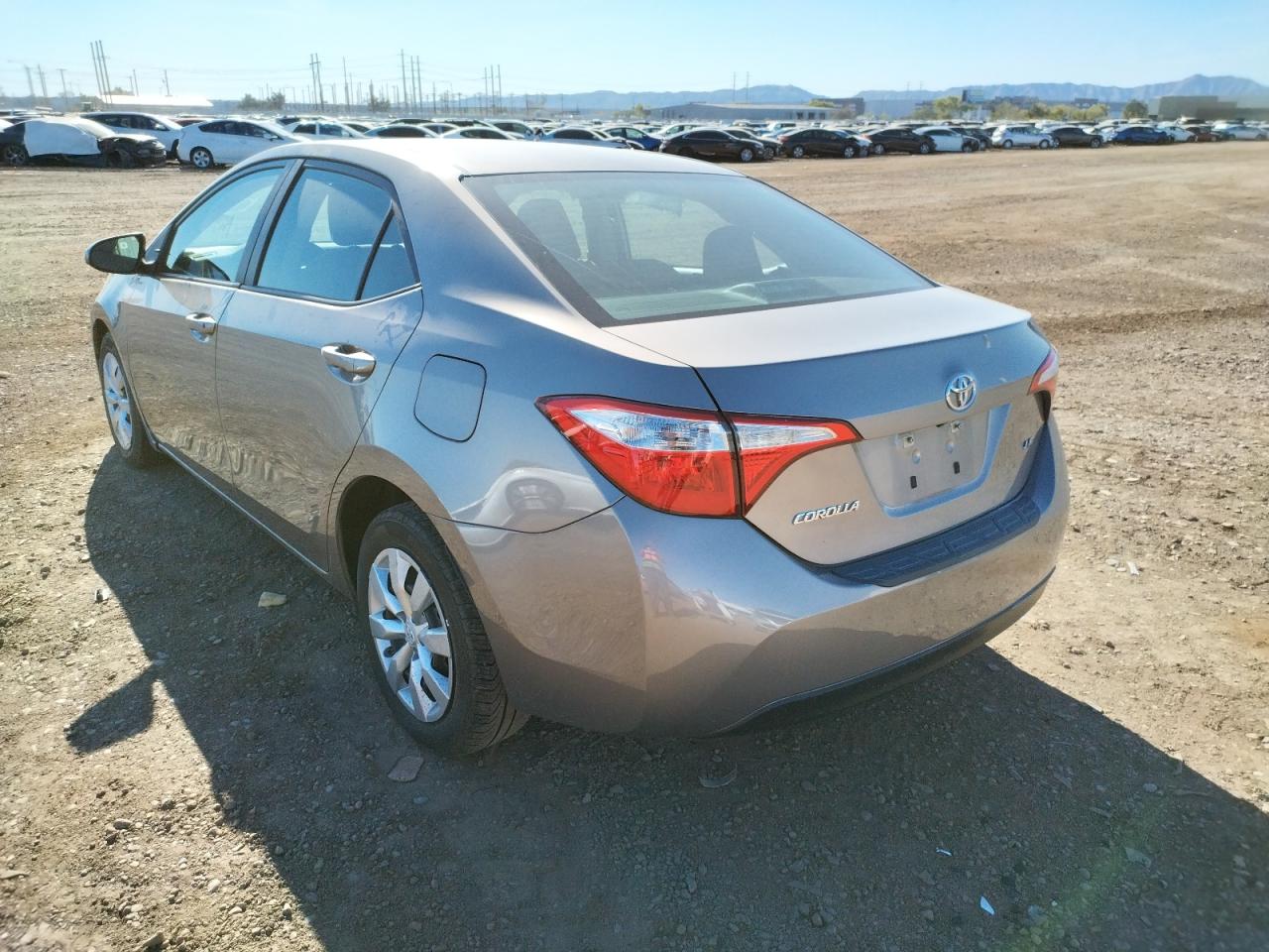 Photo 3 from auction – 2014 TOYOTA COROLLA L with VIN 5YFBURHE7EP025153