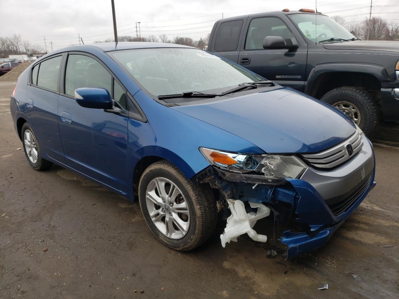 HONDA INSIGHT EX 2011 with VIN JHMZE2H70BS009020 - Photo from auction