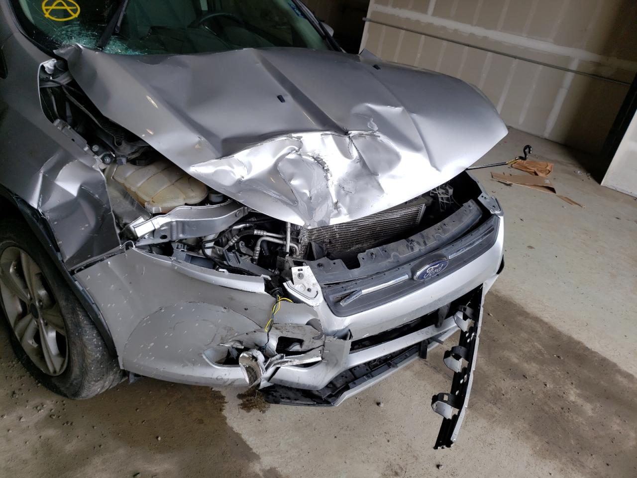 Photo 9 from auction – 2016 FORD ESCAPE SE with VIN 1FMCU9G96GUC63358