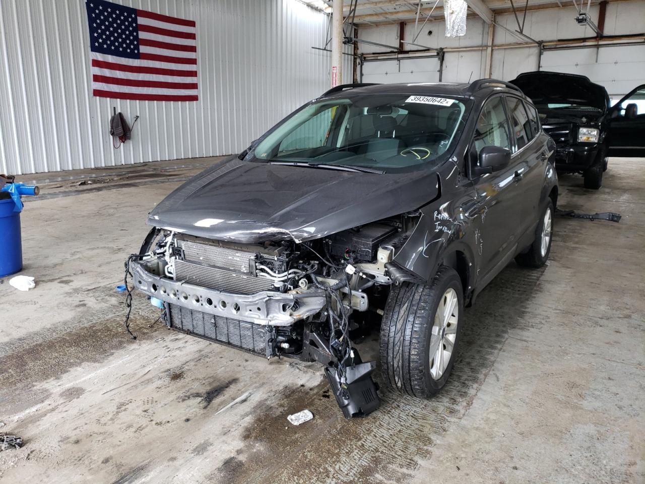 Photo 2 from auction – 2018 FORD ESCAPE SE with VIN 1FMCU9GD7JUA53783