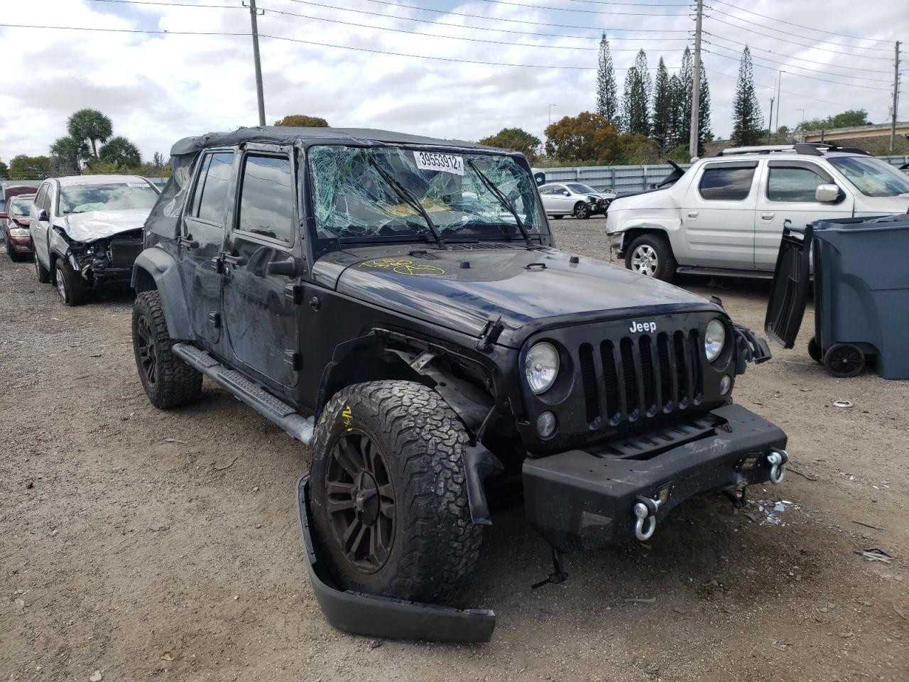 Photo 1 from auction – 2014 JEEP WRANGLER U with VIN 1C4BJWDG1EL104857
