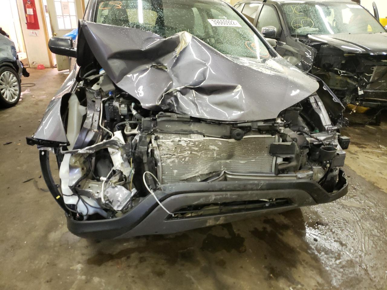 Photo 9 from auction – 2016 HONDA CR-V LX with VIN 5J6RM4H38GL075730
