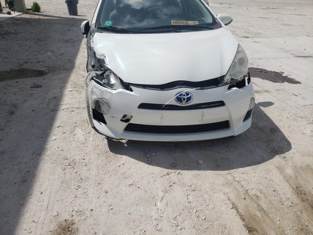 Photo 9 from auction – 2012 TOYOTA PRIUS C with VIN JTDKDTB3XC1507038