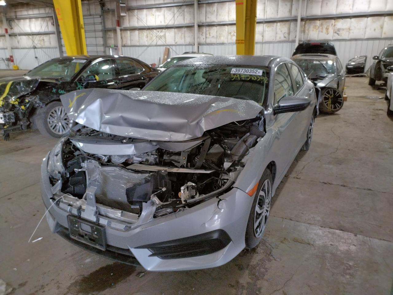 Photo 2 from auction – 2017 HONDA CIVIC LX with VIN 2HGFC2F54HH570463