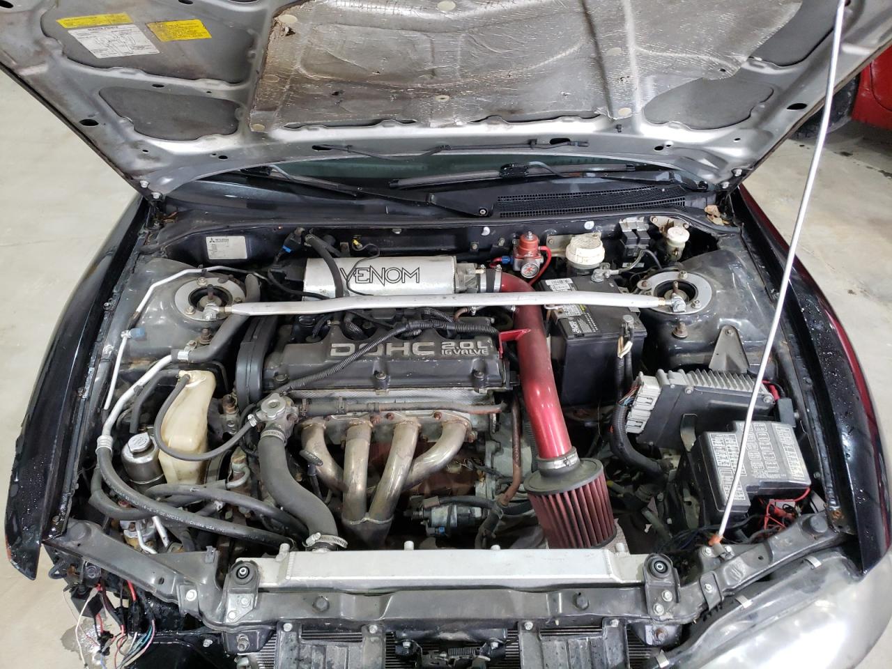Photo 7 from auction – 1998 MITSUBISHI ECLIPSE RS with VIN 4A3AK34Y7WE152334