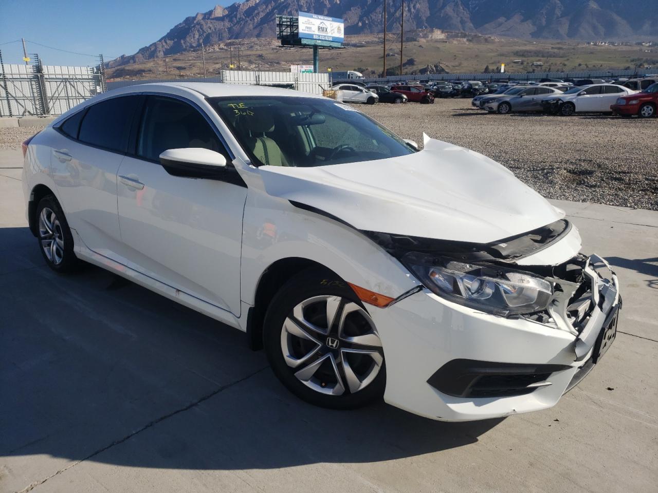 HONDA CIVIC LX 2017 with VIN 19XFC2F57HE012486 - Photo from auction