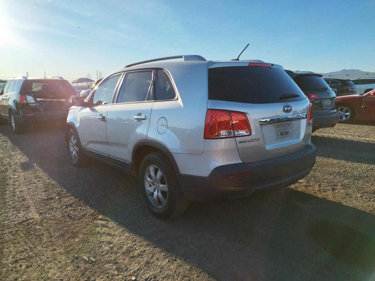 Photo 3 from auction – 2013 KIA SORENTO LX with VIN 5XYKTDA29DG352565