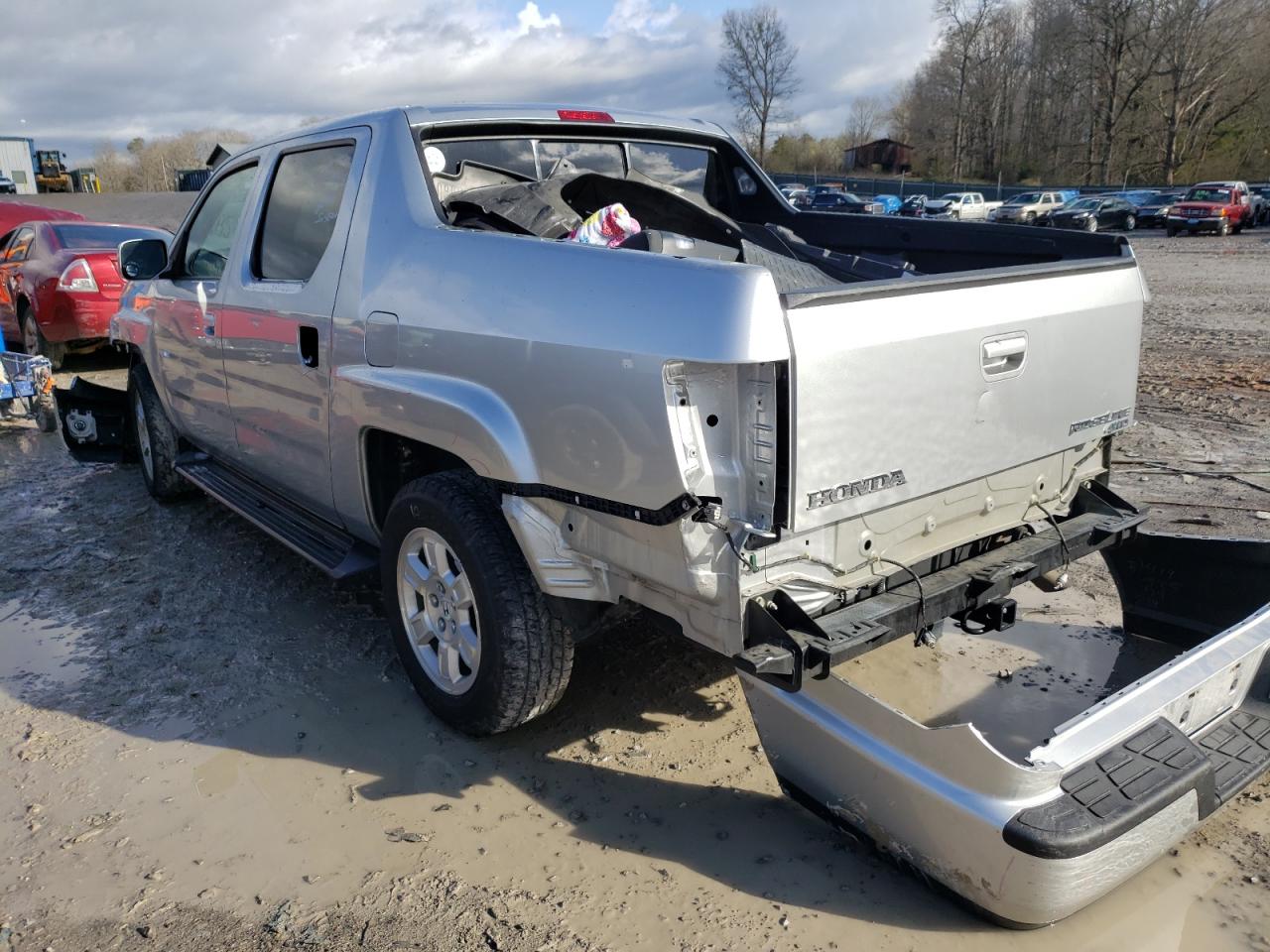 Photo 3 from auction – 2011 HONDA RIDGELINE with VIN 5FPYK1F48BB004726