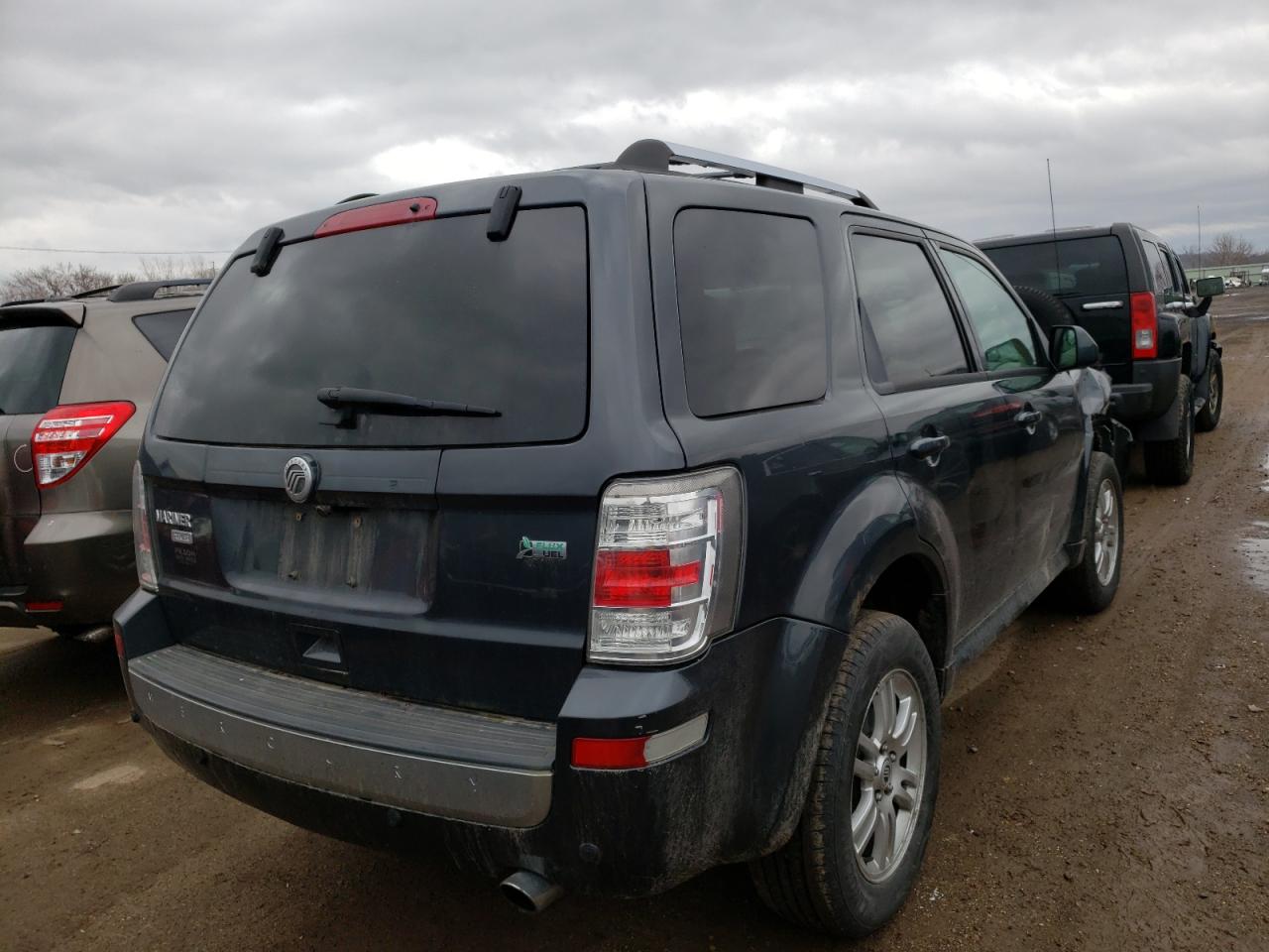 Photo 4 from auction – 2010 MERCURY MARINER PR with VIN 4M2CN8HG2AKJ23250