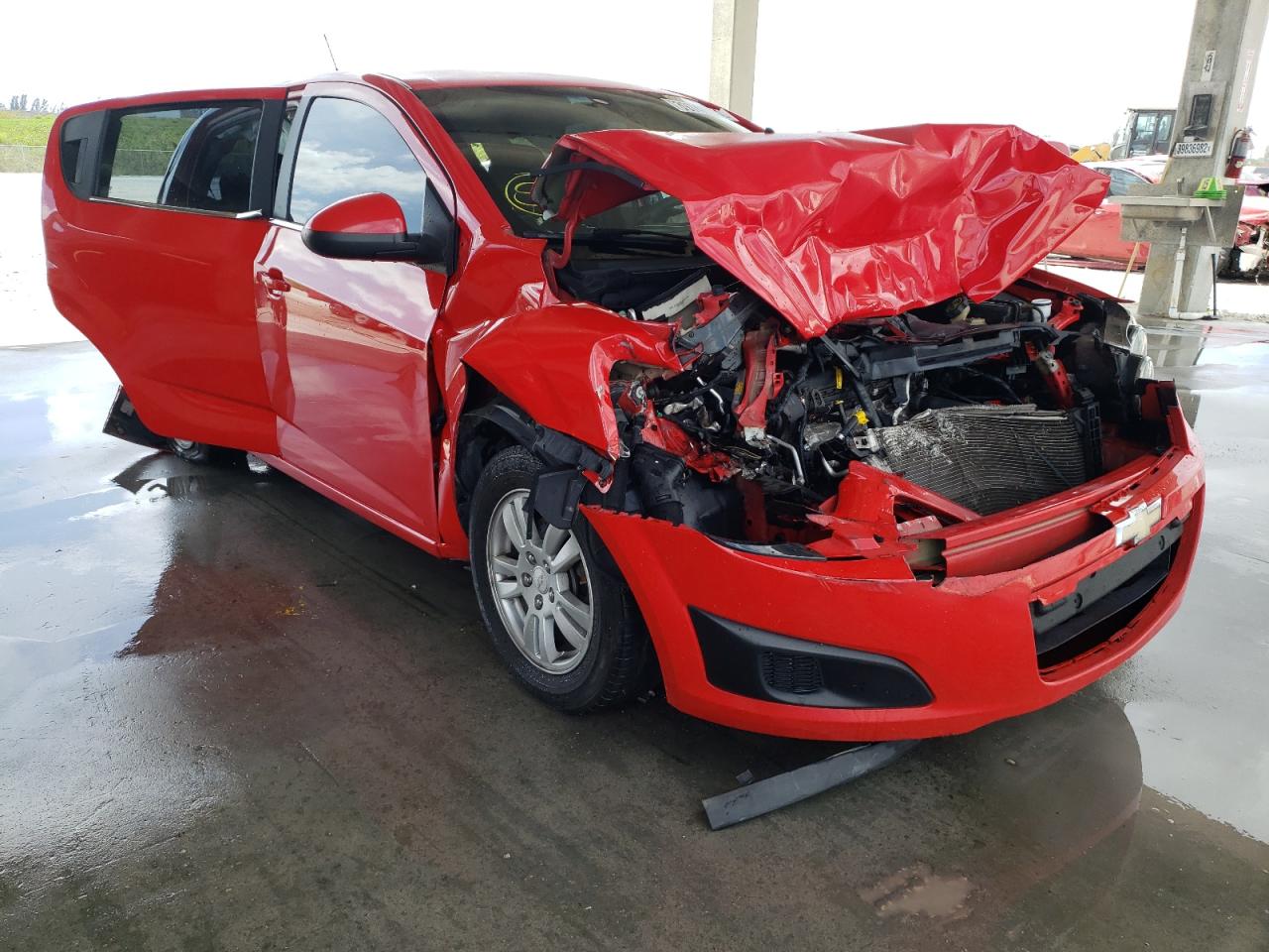 CHEVROLET SONIC 2014 with VIN 1G1JC6SH1E4112803 - Photo from auction