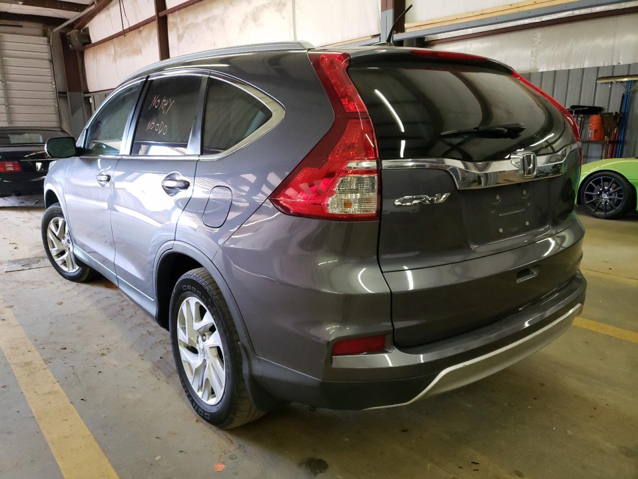Photo 9 from auction – 2016 HONDA CR-V EXL with VIN 2HKRM3H77GH500152