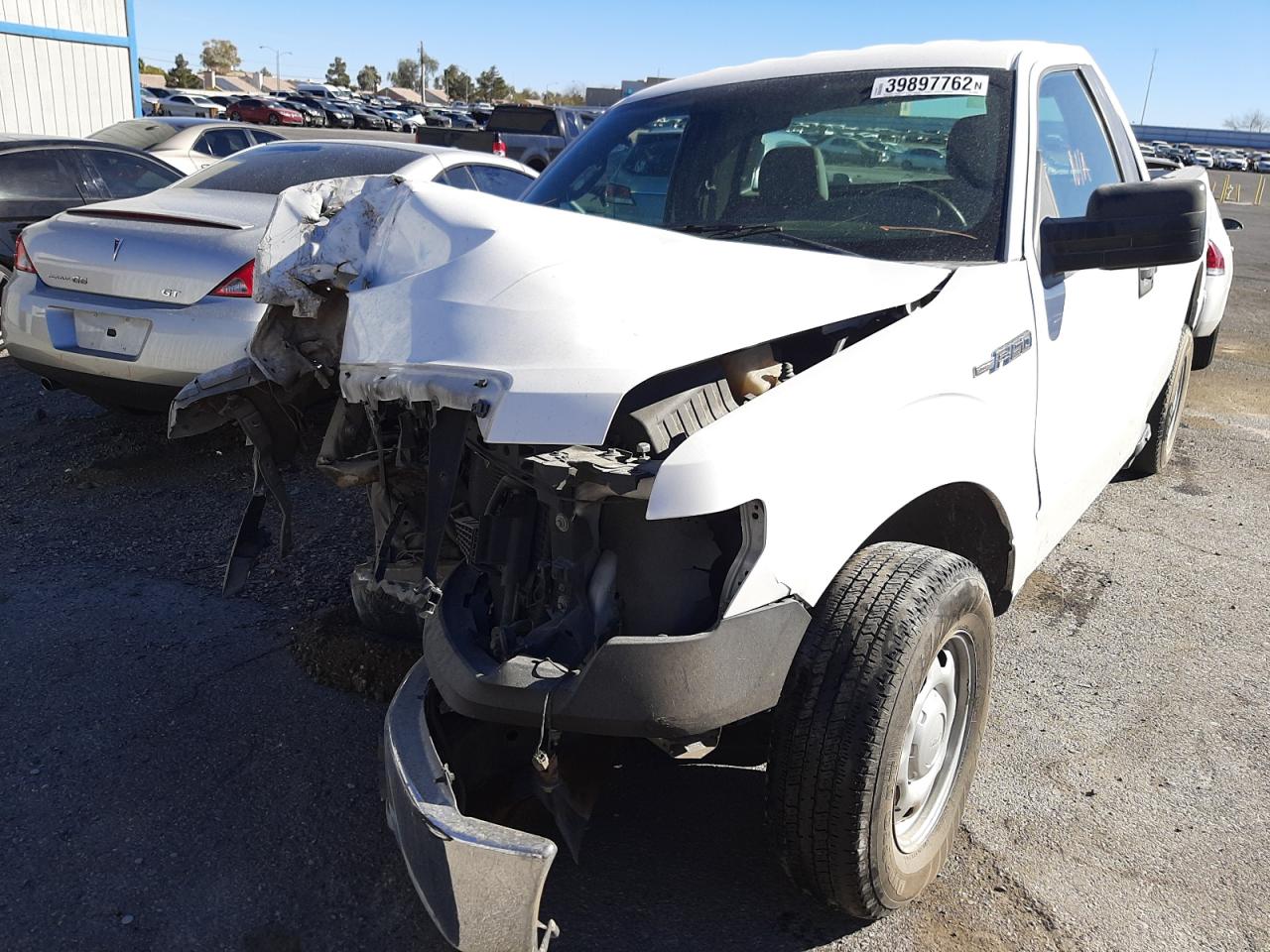 Photo 2 from auction – 2014 FORD F150 with VIN 1FTMF1CM7EKE01366