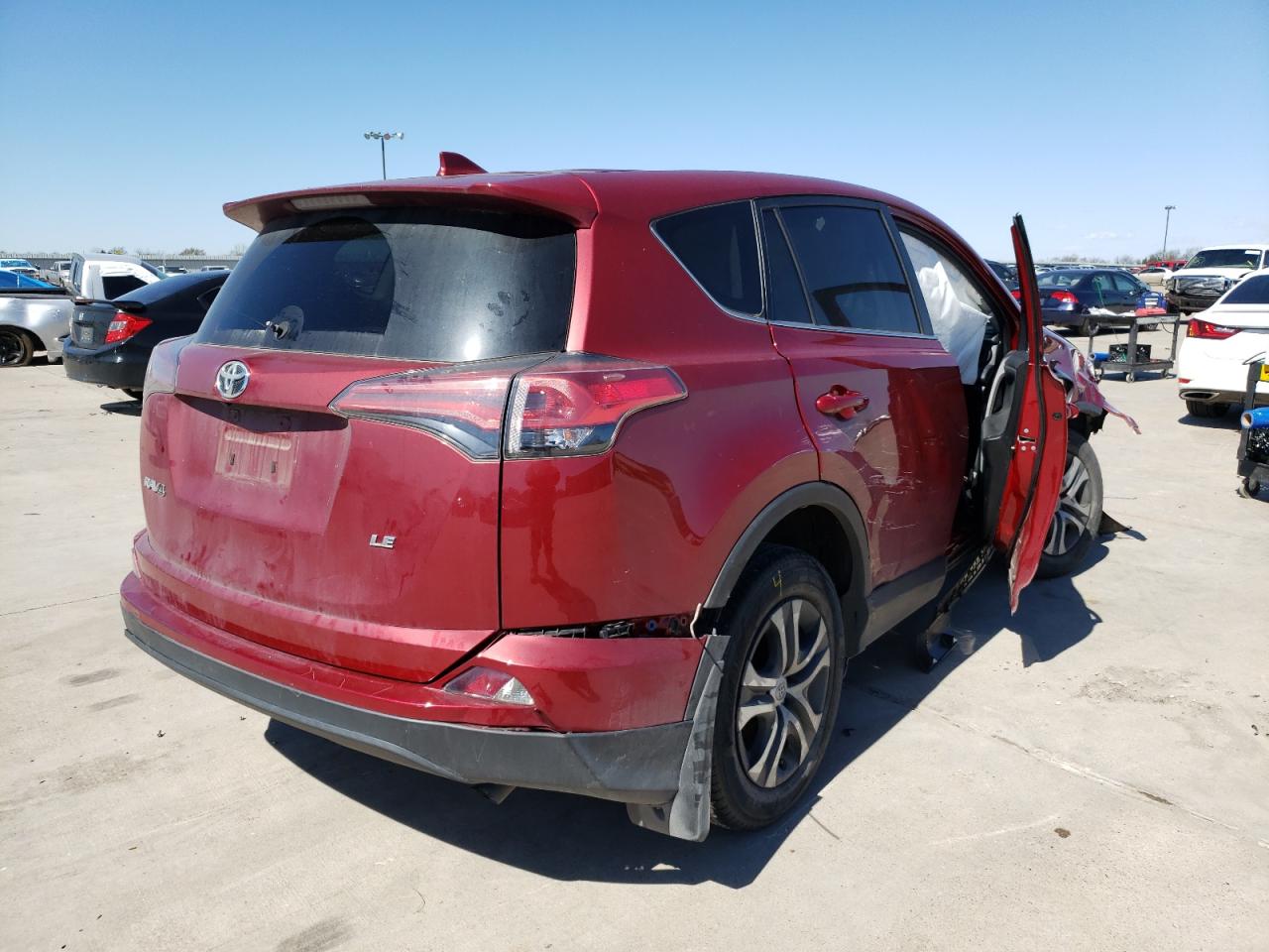Photo 4 from auction – 2018 TOYOTA RAV4 LE with VIN 2T3ZFREV8JW495852