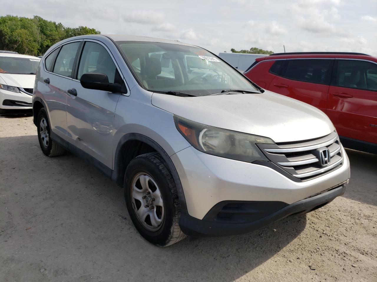 HONDA CR-V LX 2014 with VIN 3CZRM3H32EG703754 - Photo from auction