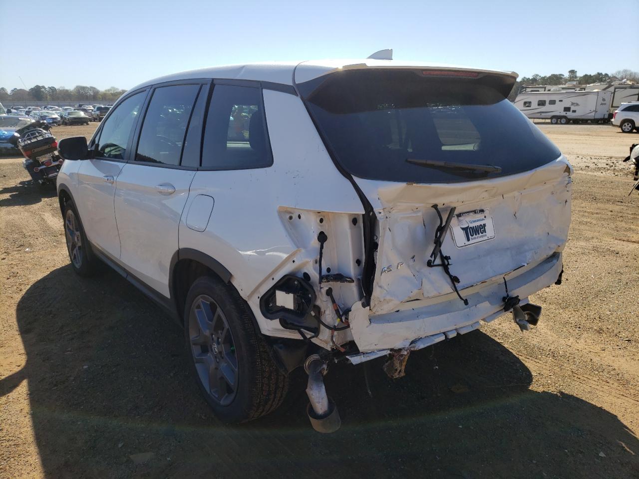 Photo 3 from auction – 2022 HONDA PASSPORT E with VIN 5FNYF7H54NB001123