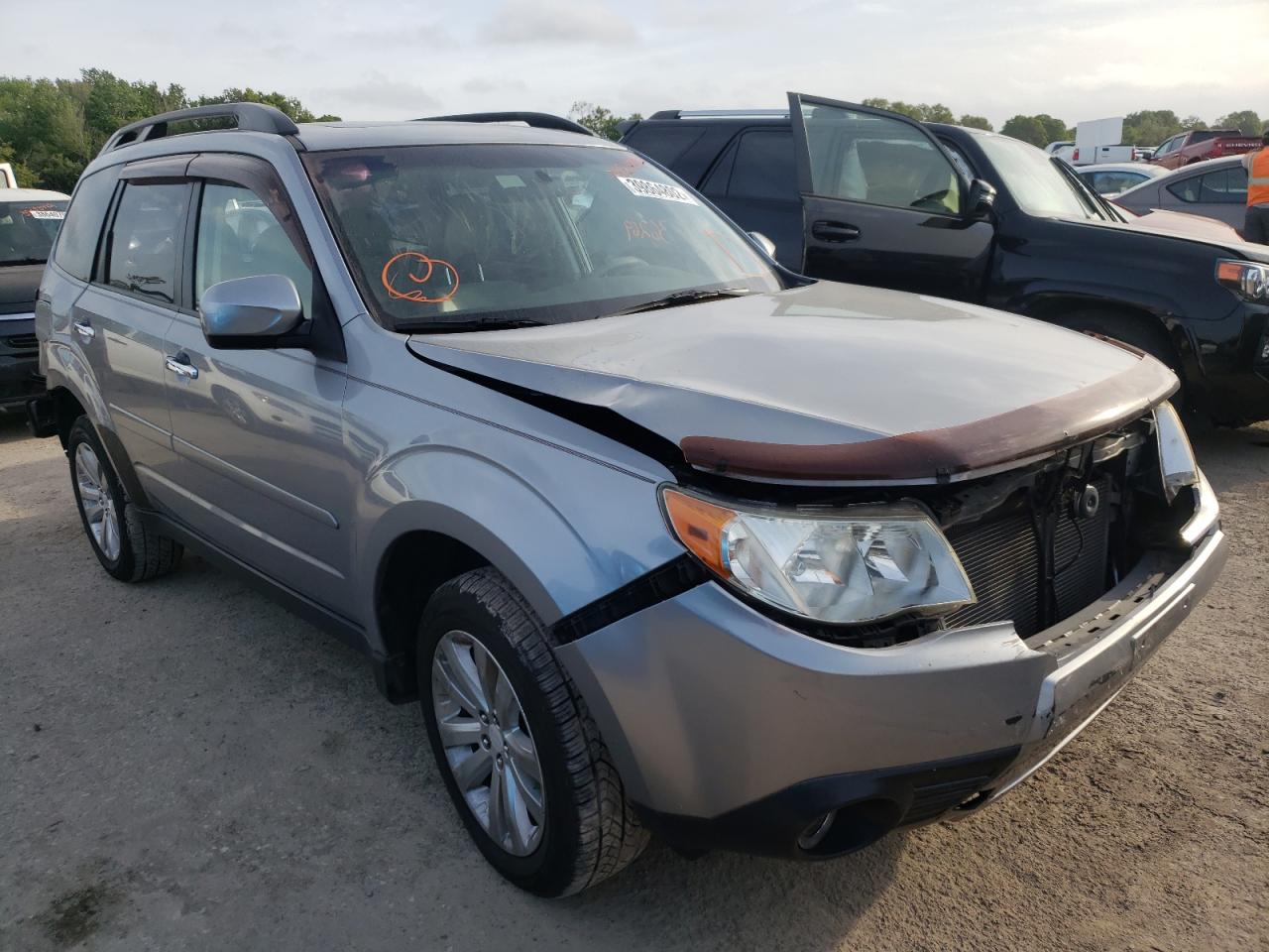 SUBARU FORESTER L 2011 with VIN JF2SHBEC1BH745149 - Photo from auction