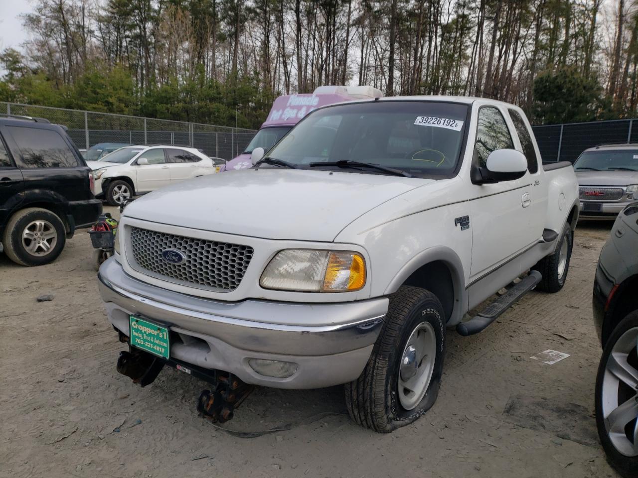 Photo 2 from auction – 1999 FORD F-150 with VIN 2FTRX08W5XCB02716