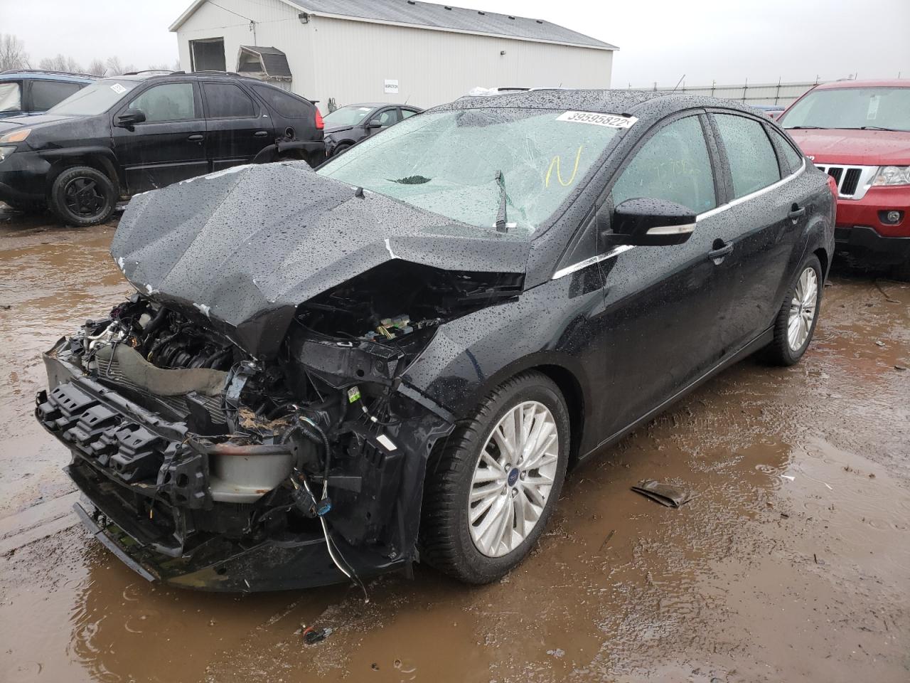 Photo 2 from auction – 2016 FORD FOCUS TITA with VIN 1FADP3J26GL237251