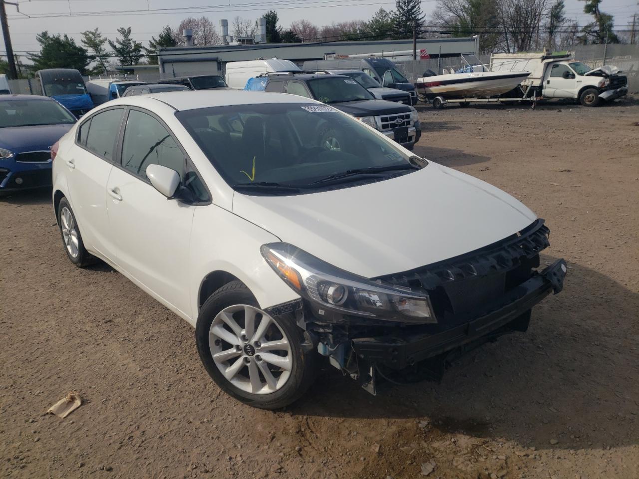 KIA FORTE LX 2017 with VIN 3KPFL4A75HE052943 - Photo from auction