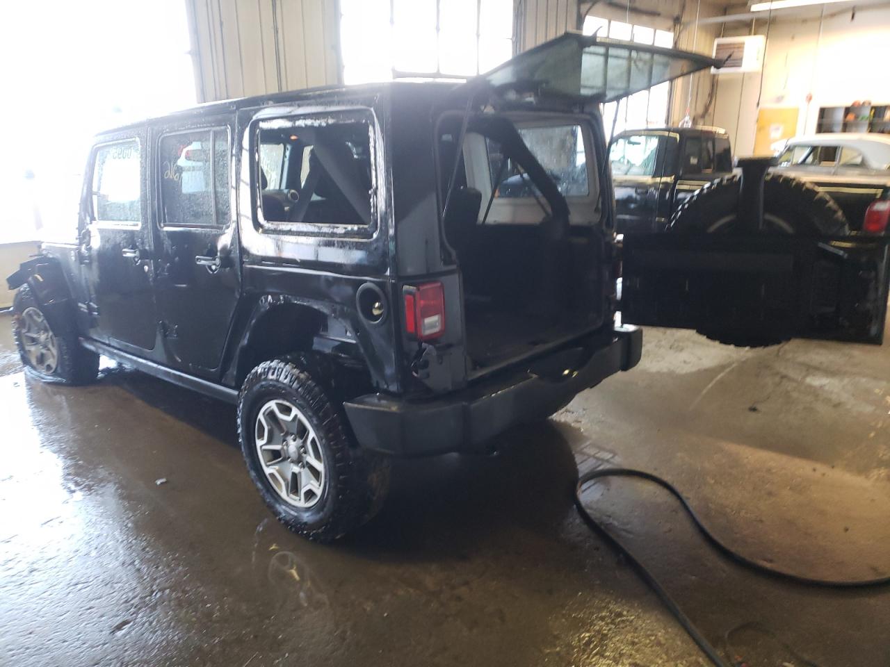 Photo 3 from auction – 2015 JEEP WRANGLER U with VIN 1C4BJWFGXFL586663