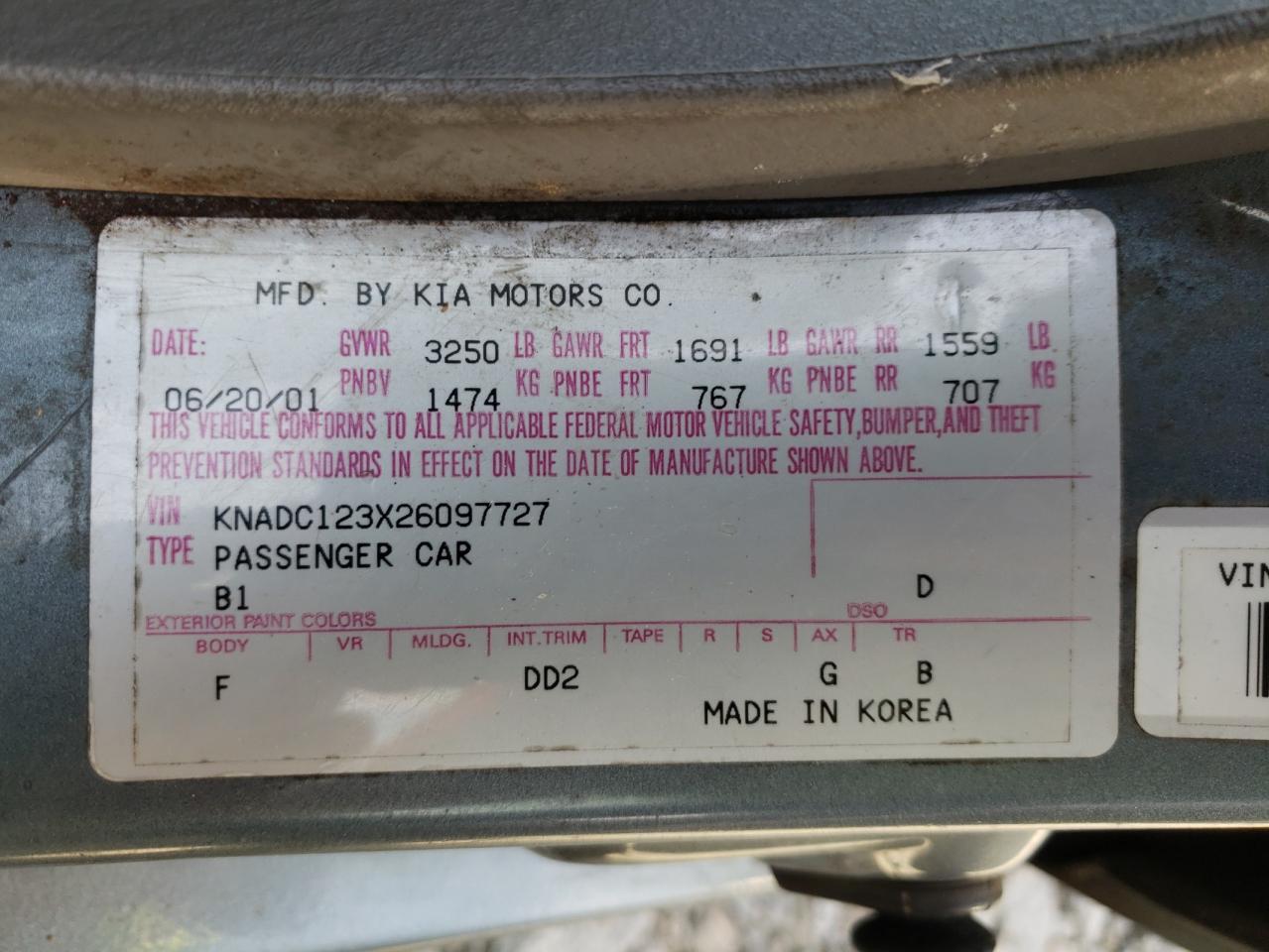 Photo 10 from auction – 2002 KIA RIO with VIN KNADC123X26097727