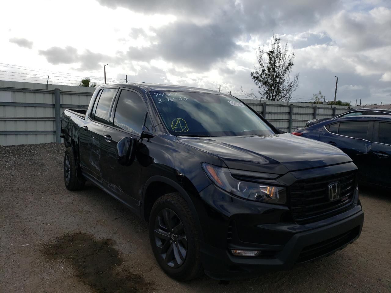 HONDA RIDGELINE 2021 with VIN 5FPYK3F17MB017424 - Photo from auction