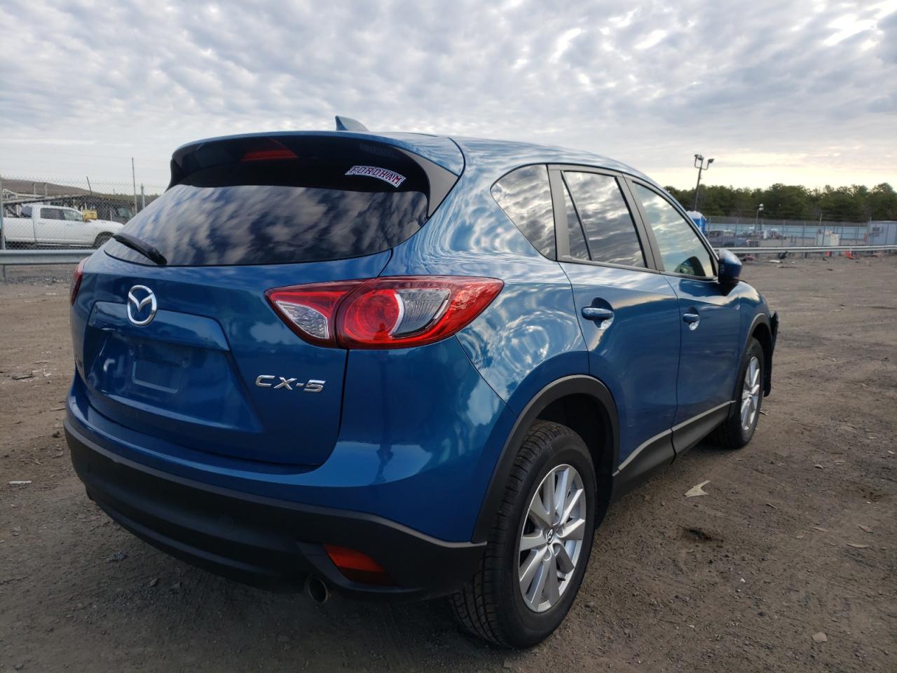Photo 4 from auction – 2014 MAZDA CX-5 SPORT with VIN JM3KE2BEXE0377738