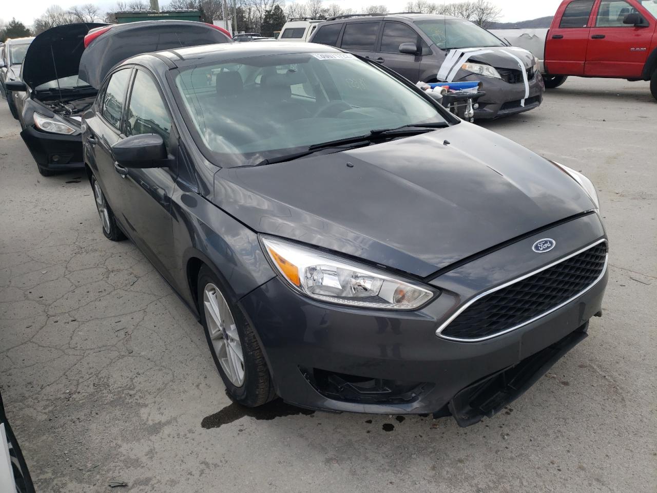 FORD FOCUS SE 2018 with VIN 1FADP3F23JL208936 - Photo from auction