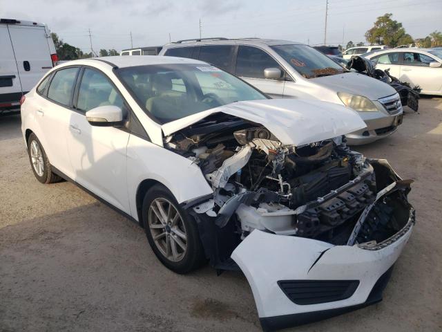 FORD FOCUS SE 2015 with VIN 1FADP3F21FL349818 - Photo from auction