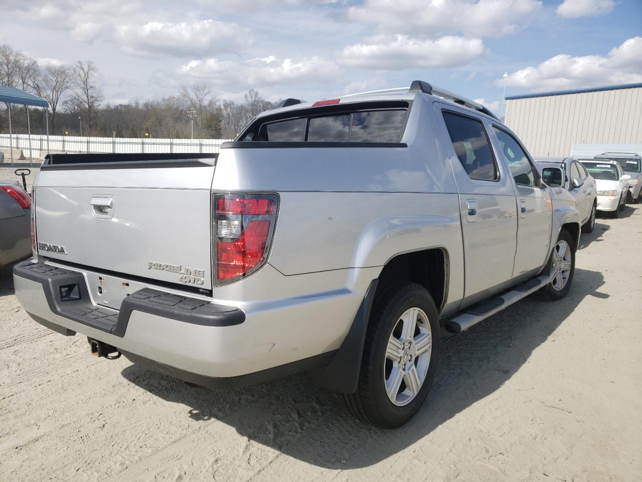 Photo 4 from auction – 2012 HONDA RIDGELINE with VIN 5FPYK1F55CB461195