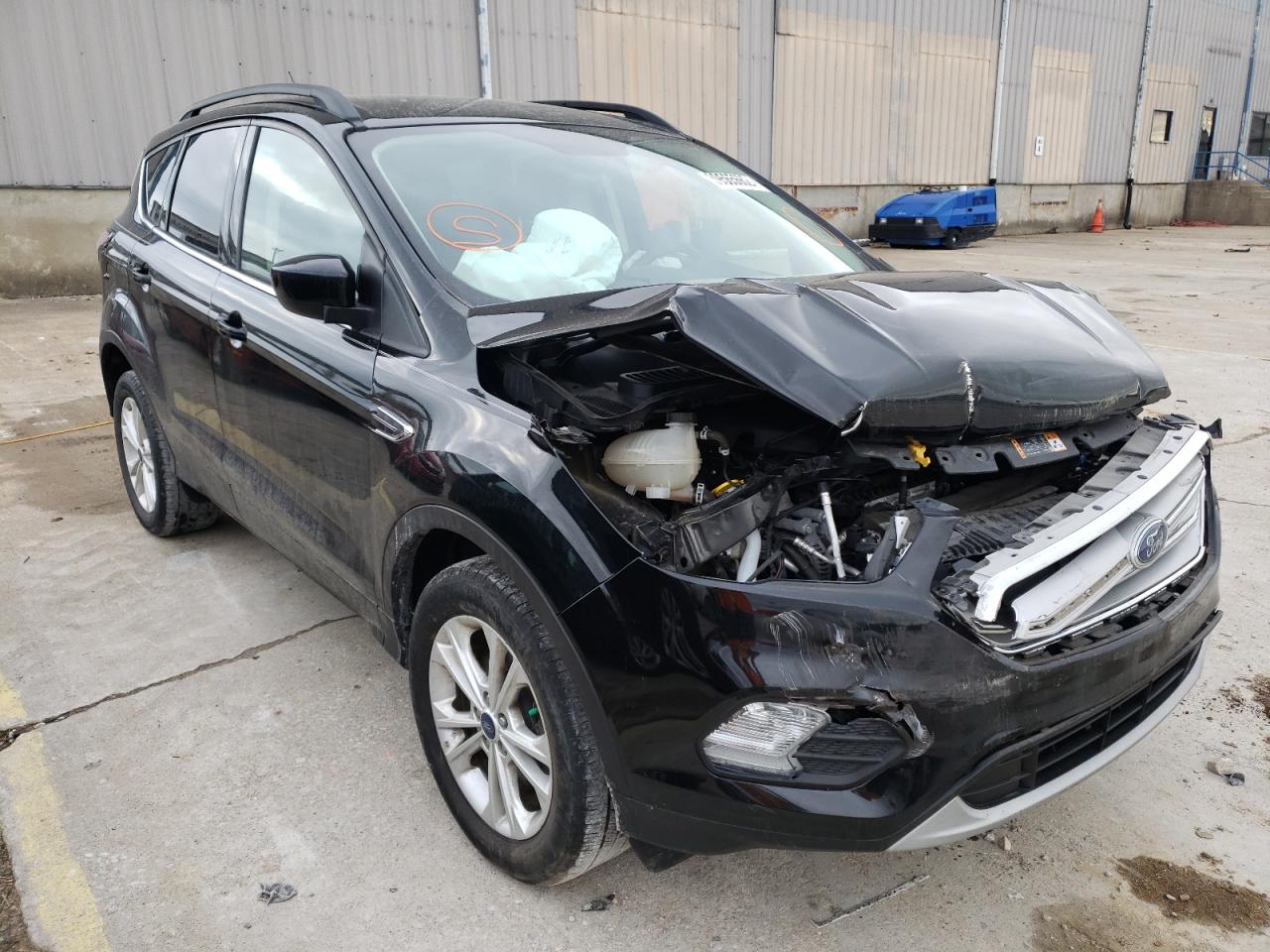 FORD ESCAPE SE 2018 with VIN 1FMCU9GD6JUA53578 - Photo from auction