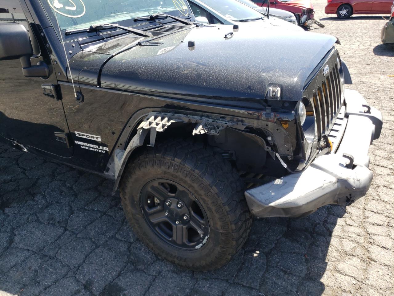 Photo 9 from auction – 2016 JEEP WRANGLER U with VIN 1C4BJWDG0GL323568