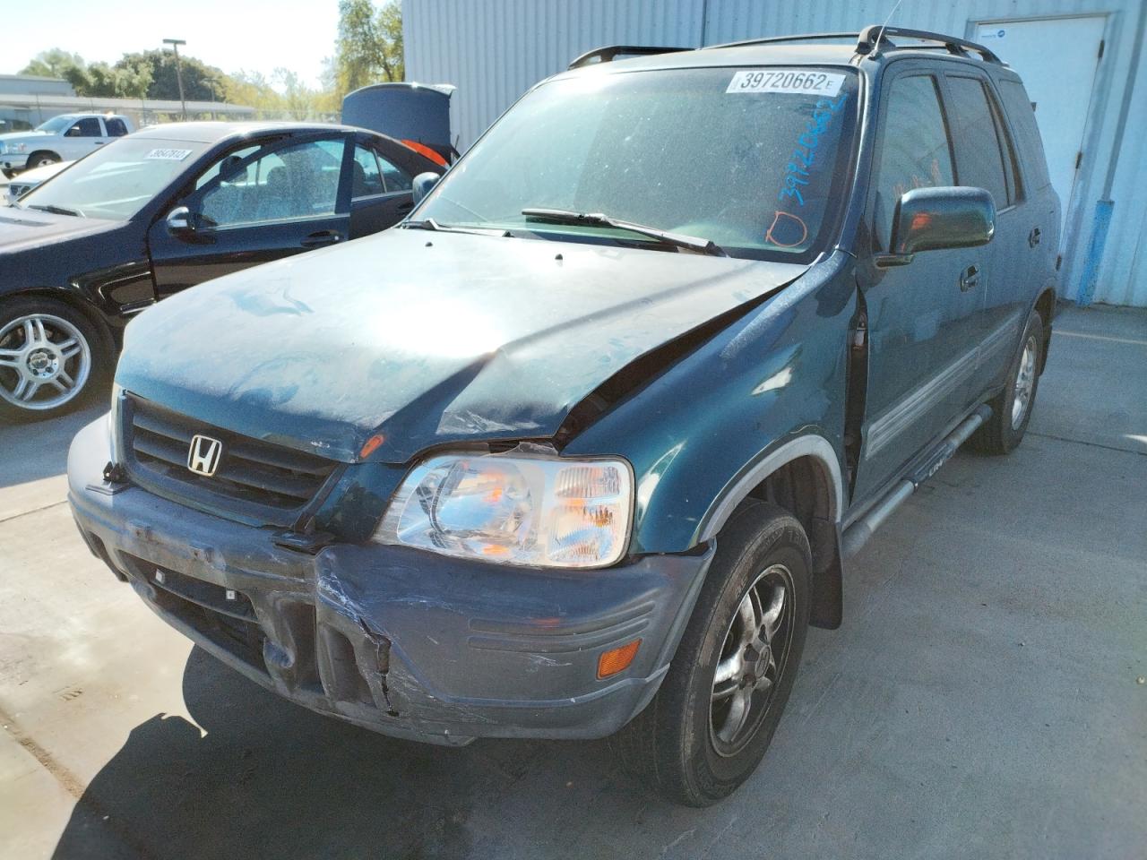Photo 2 from auction – 1998 HONDA CR-V EX with VIN JHLRD1863WC083766
