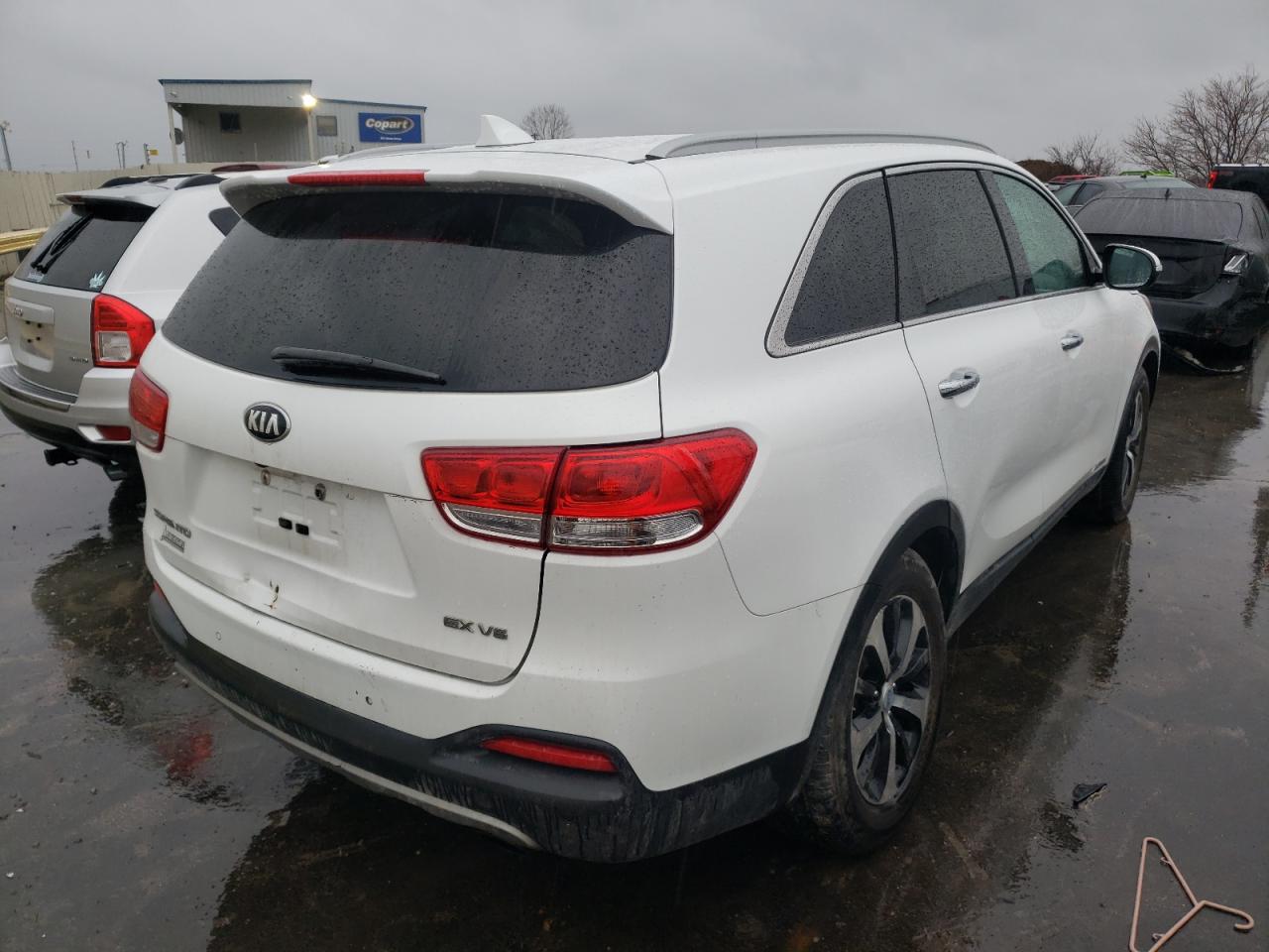 Photo 4 from auction – 2016 KIA SORENTO EX with VIN 5XYPHDA56GG178833