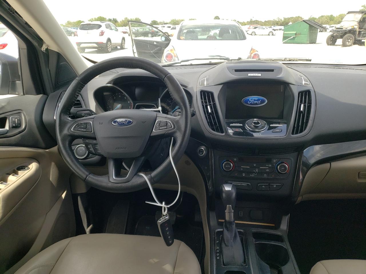 Photo 9 from auction – 2017 FORD ESCAPE TIT with VIN 1FMCU0J92HUB20042