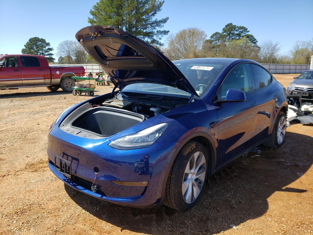 Photo 2 from auction – 2021 TESLA MODEL Y with VIN 5YJYGDEE1MF138647